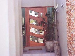 contemporary-pivot-door-and-sidelight-entries-2